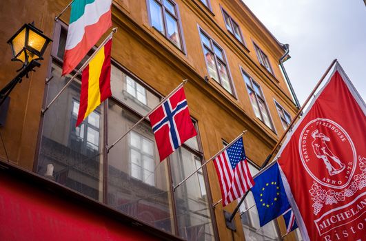 April 22, 2018, Stockholm Sweden. Flags of Italy, Spain, Norway, USA, EU and UK at the restaurant building in Stockholm.