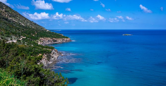 Green mountainous coast of the Mediterranean Sea on the Akamas Peninsula in the northwest of the island of Cyprus.