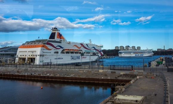 22 April 2019, Stockholm, Sweden. High-speed passenger and car ferrys of the Estonian shipping concern Tallink Silja Europa and Baltic Queen in the port Vartahamnen in Stockholm.