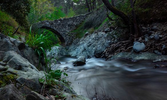 Ancient stone Venetian bridge in the Troodos mountains on the island of Cyprus.