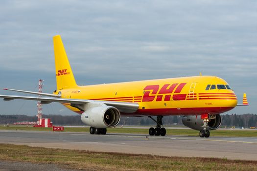 October 29, 2019, Moscow, Russia. Plane 
Tupolev Tu-204 Aviastar Airlines in livery DHL at Sheremetyevo airport in Moscow.