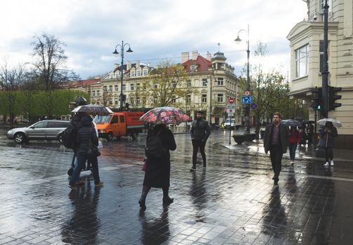 April 27, 2018 Vilnius, Lithuania. Citizens at the pedestrian crossing in Vilnius.