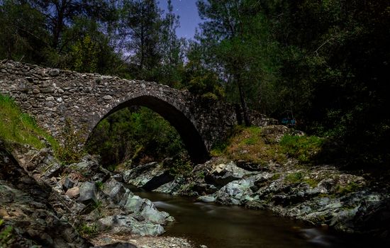 Ancient stone Venetian bridge in the Troodos mountains on the island of Cyprus.