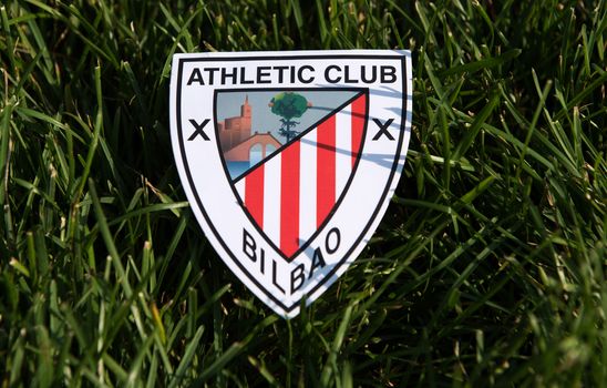 September 6, 2019 Istanbul, Turkey. The emblem of the Spanish football club Athletic Bilbao on the green grass of the football field.
