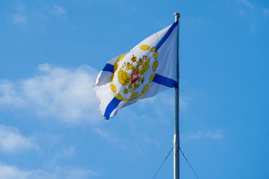 Flag of the Commander of the Russian Navy on the Admiralty building in St. Petersburg.