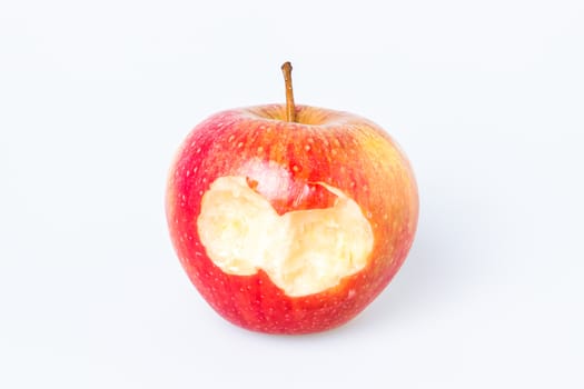 Organic bitten apple isolated on white background