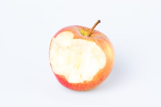 Organic bitten apple isolated on white background
