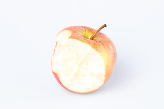 Organic bitten apple isolated on white background