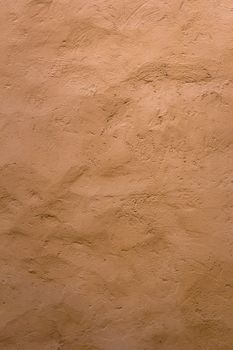 Wall decorated with Venetian plaster and rough plaster.