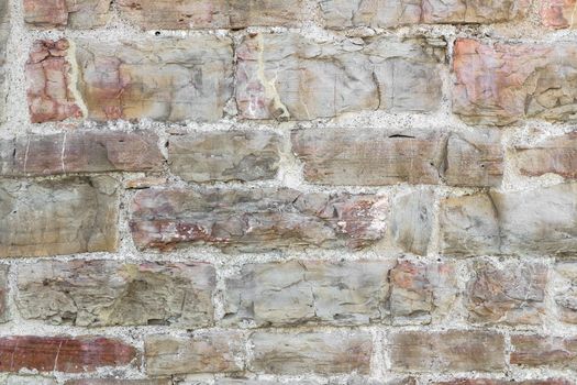 Stone wall pattern. Close up of big concrete bricks outside.
