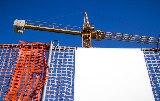Blank billboard customizable on the construction site.