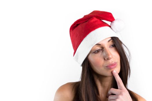 Beautiful female model, with brown hair, wear santa hat. Isolated over a white background.