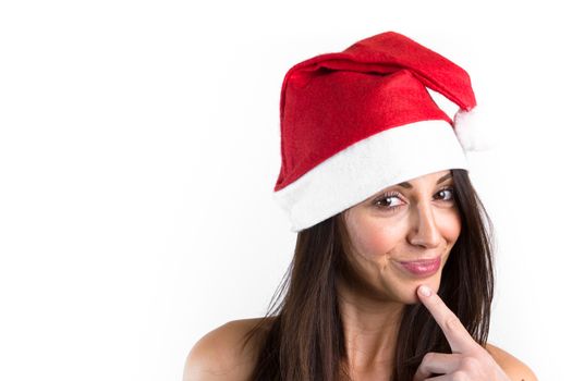 Beautiful female model, with brown hair, wear santa hat. Isolated over a white background.