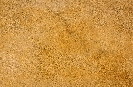 Mediterranean wall background, terracotta orange colored texture.