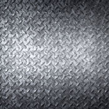 Aluminum dark list with rhombus shapes; industrial texture for background.
