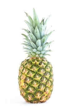 A big pineapple, vertically framed and isolated on white background.