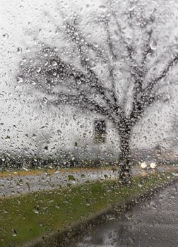 Bad Weather Driving - poor view caused by heavy rain and spray water