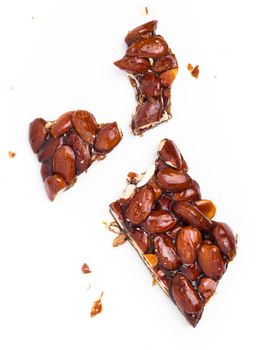 Caramelized almonds. Classic Sicilian Nougat composed of almonds and sugar. The nougat has been broken