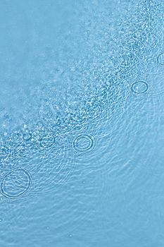 Designs and shapes on the water surface of a pool.