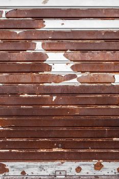 Old rusty garage shutter. Ideal for concepts and backgrounds.