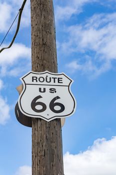 Route US 66 highway sign small shield shape on power pole1  one of the incredible variety of 66 signs seen along the historic route.