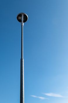 LED street lamp on blue sky