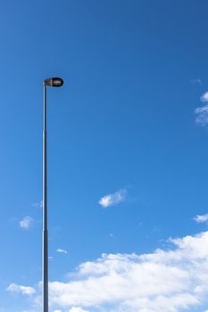 LED street lamp on blue sky