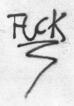 Fuck written/painted on concrete wall. Graffiti, texture, message, quote, anger concept