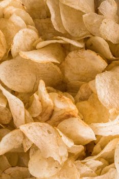 Crispy potato chips background