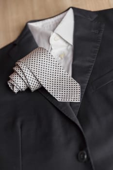 Jacket and tie detail. concept of Italian tailoring. Quality, style, made in Italy.