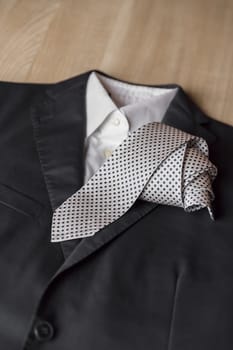 Jacket and tie detail. concept of Italian tailoring. Quality, style, made in Italy.