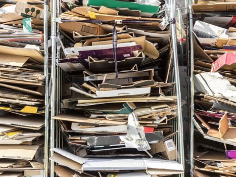 Stack of paper for recycling in metal containers