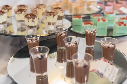 Buffet mousse dessert in little glasses. Catering for wedding, party or events.