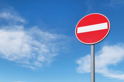 No entry for vehicular traffic. Road sign against blue sky. Space for text.