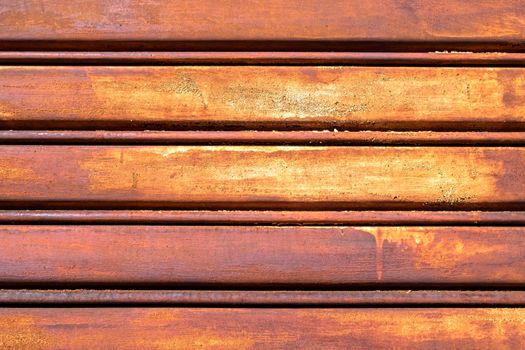 Rusty metal shutter gate. Grungy background texture.