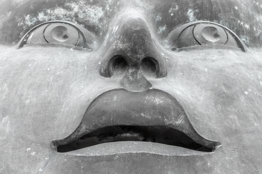 Modern sculpture of a man's face. Close-up.