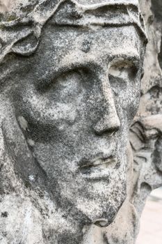 Fragment of Jesus Christ statue as a symbol of love, faith and religion.