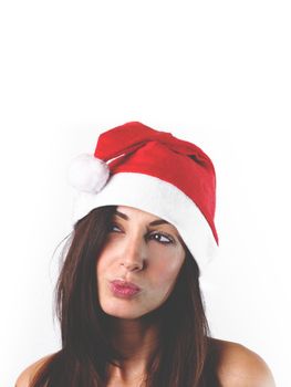 Girl with Christmas hat over isolated white background having doubts and with confuse face expression. Vintage / social photo style. Copy space.