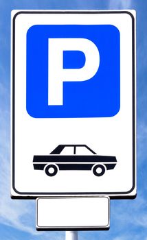 Parking sign with blue sky background on sunny day