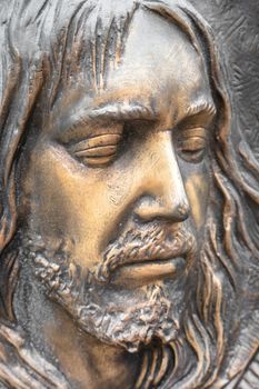 Bronze statue of the face of jesus. Ancient sculpture. Ideal for concepts or events like Easter.