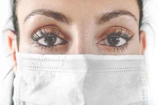 Doctor in a medical mask. Medical mask on woman face. Patient, nurse. Protection against CORONAVIRUS COVID-19.