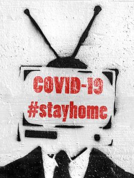 Tv head with hashtag #stayhome (COVID-19). Coronavirus in the world. COVID-19 alert banner. 2019 Coronavirus concept, for an outbreak occurs in Wuhan - China.