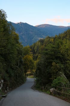 Beautiful winding mountain road in the evening