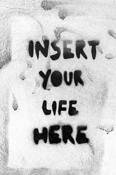 Message "Insert your life here" on wall with grungy frame. Grunge wall background. Ideal for concepts. It can be used as a urban theme, poster, wallpaper, design t-shirts and more.