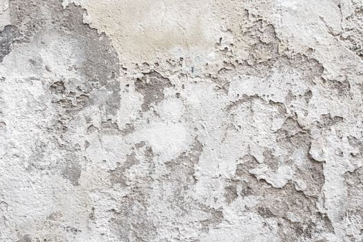 Blank peeled messy surface. White and gray peeling plaster background texture.