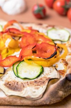 Fresh, veggie pizza with peppers, aubergines and grilled courgettes.