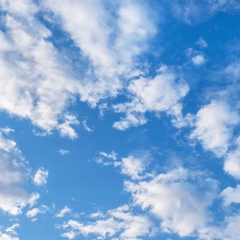 Blue sky background with clouds. Ideal for texture and concepts.