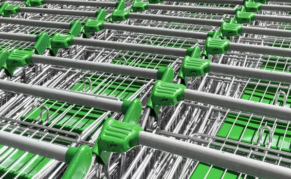 Green shopping trolleys in a superstore