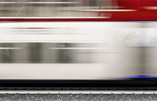 Modern high speed train with motion blur. Abstract composition of moving train with motion blur.