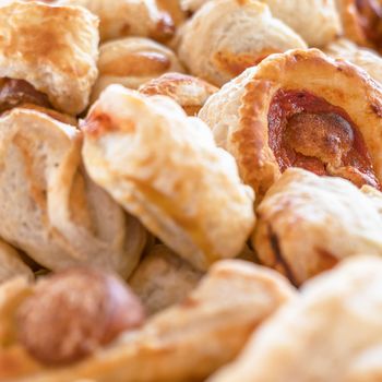 Vol-au-vents puff pastry with meat and tomato. Close-up. Shallow DOF.